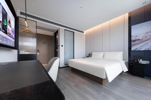 Imagen de la habitación del Atour Hotel Jinan Shungeng Covention and Exhibition Center Bayi Overpass. Foto 20