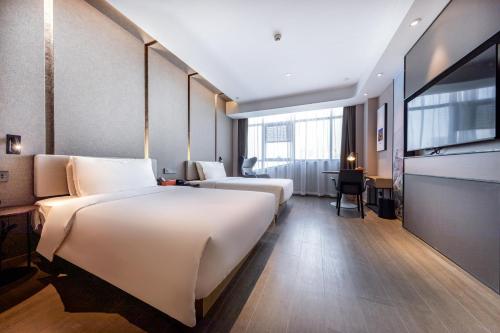 Imagen de la habitación del Atour Hotel Taian Taishan Internation Convention and Exhibition Center. Foto 11