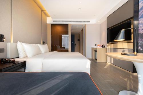 Imagen de la habitación del Atour Hotel Taian Taishan Internation Convention and Exhibition Center. Foto 17