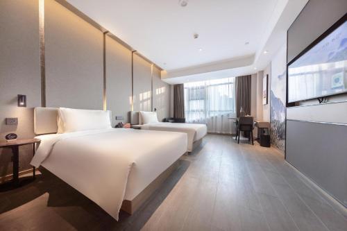 Imagen de la habitación del Atour Hotel Taian Taishan Internation Convention and Exhibition Center. Foto 19