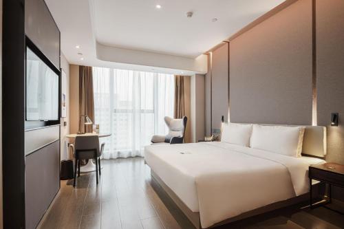 Imagen de la habitación del Atour Hotel Taian Taishan Scenic Area Pangu Tiandi. Foto 16