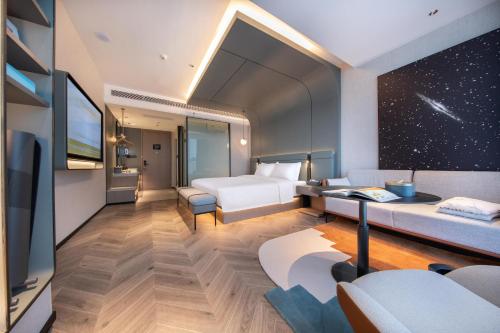 Imagen de la habitación del Atour S Hotel Ningbo Binjiang Olympic Sports Center. Foto 15