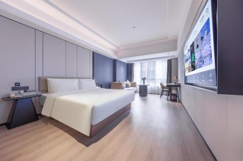 Imagen de la habitación del Atour X Hotel Shenzhen Sungang Diwang Mansion. Foto 9