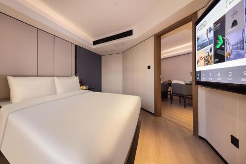 Imagen de la habitación del Atour X Hotel Shenzhen Sungang Diwang Mansion. Foto 14