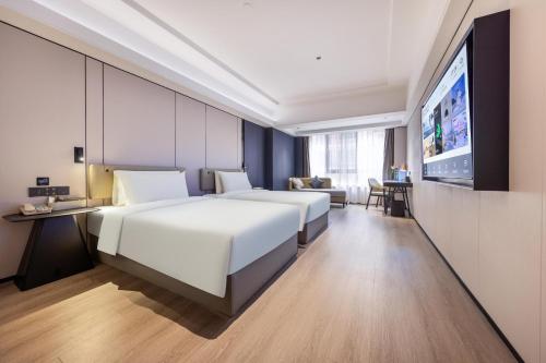 Imagen de la habitación del Atour X Hotel Shenzhen Sungang Diwang Mansion. Foto 15