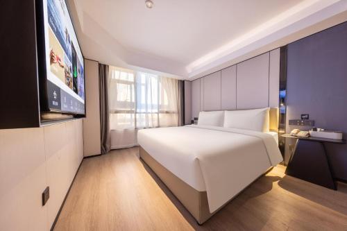 Imagen de la habitación del Atour X Hotel Shenzhen Sungang Diwang Mansion. Foto 18