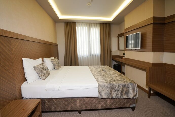 Imagen de la habitación del Atro Hotel. Foto 18