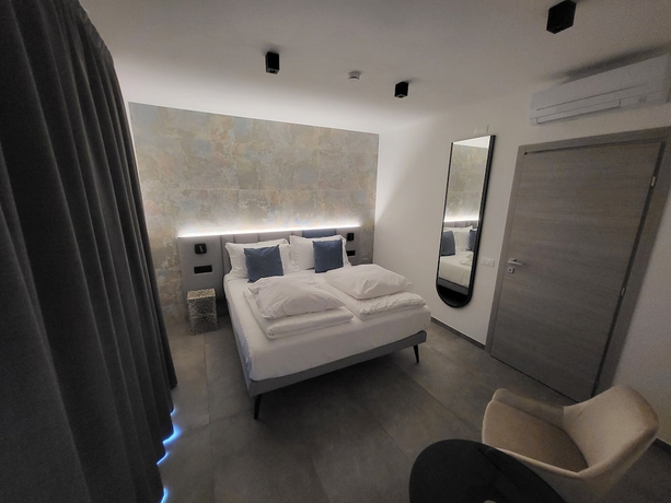Imagen de la habitación del Attilio High Living Suites - Adults Only. Foto 9