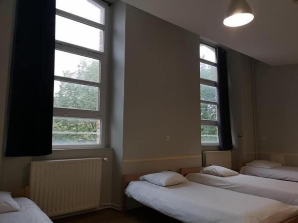 Imagen de la habitación del Auberge De Jeunesse Hi Amiens. Foto 12