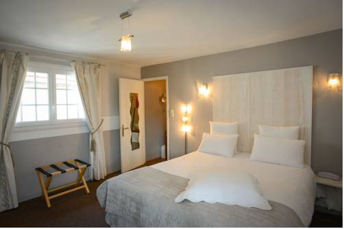 Imagen de la habitación del Auberge Normande. Foto 13