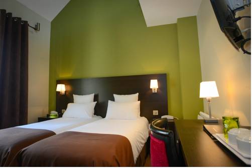Imagen de la habitación del Auberge Normande. Foto 14
