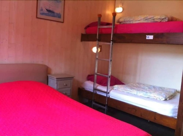 Imagen de la habitación del Auberge Riva Bella - Hostel. Foto 12