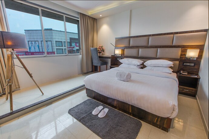 Imagen de la habitación del Aura One Hotel. Foto 14
