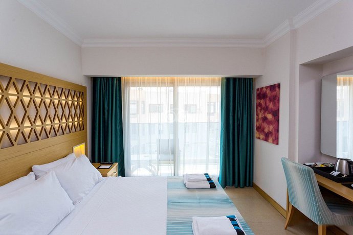 Imagen de la habitación del Aurasia Deluxe Hotel. Foto 4