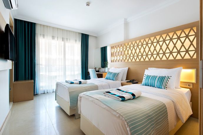Imagen de la habitación del Aurasia Deluxe Hotel. Foto 8