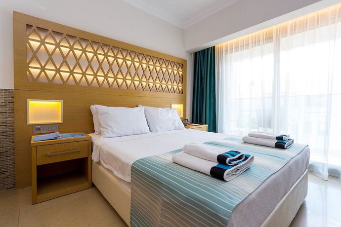 Imagen de la habitación del Aurasia Deluxe Hotel. Foto 17