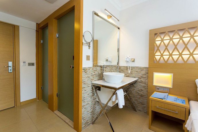 Imagen de la habitación del Aurasia Deluxe Hotel. Foto 19