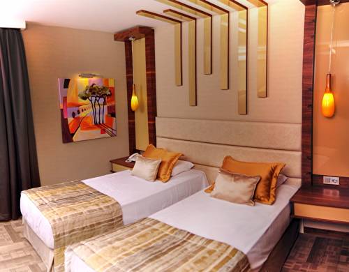 Imagen de la habitación del Avin Hotel. Foto 4