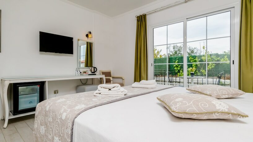 Imagen de la habitación del Avlu Alacati Butik Otel. Foto 12