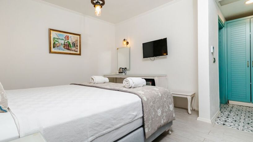 Imagen de la habitación del Avlu Alacati Butik Otel. Foto 13