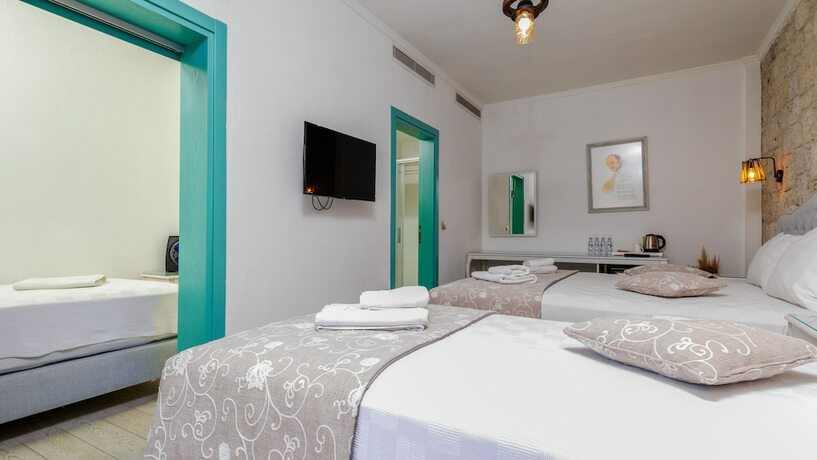 Imagen de la habitación del Avlu Alacati Butik Otel. Foto 14