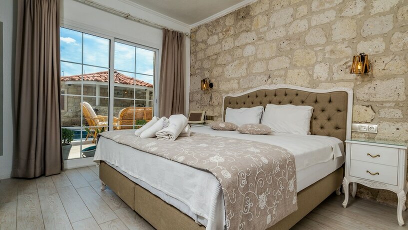 Imagen de la habitación del Avlu Alacati Butik Otel. Foto 15