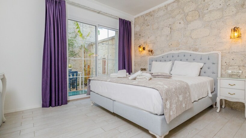 Imagen de la habitación del Avlu Alacati Butik Otel. Foto 17