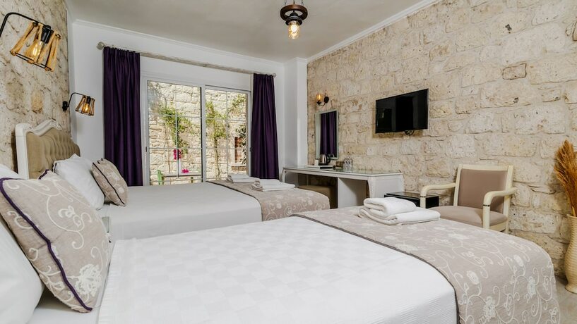 Imagen de la habitación del Avlu Alacati Butik Otel. Foto 19