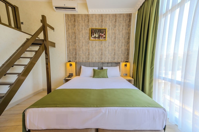 Imagen de la habitación del Ay&ccedil;i&ccedil;eği Comfort Hotel. Foto 15