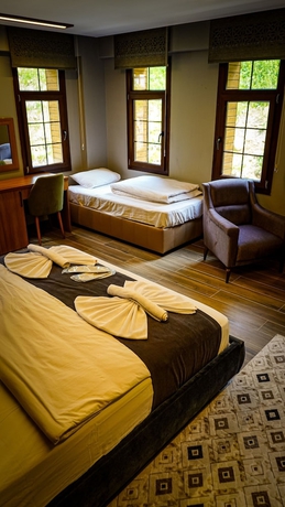 Imagen de la habitación del Ayder Kervansaray Deluxe Otel. Foto 7