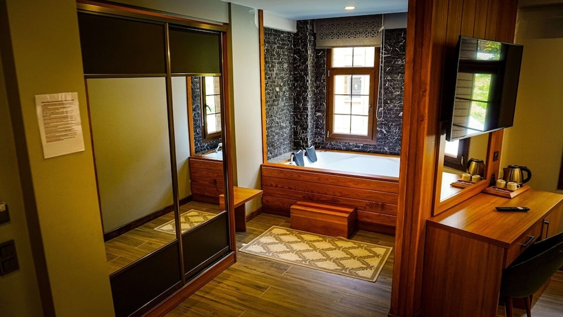 Imagen de la habitación del Ayder Kervansaray Deluxe Otel. Foto 9