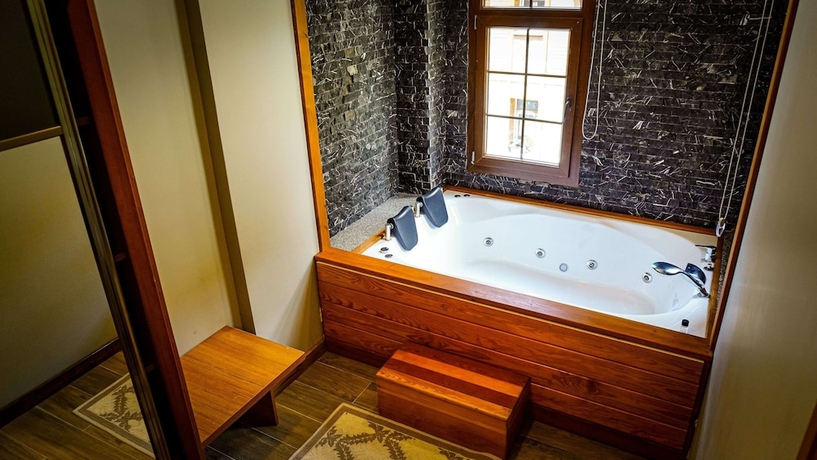 Imagen de la habitación del Ayder Kervansaray Deluxe Otel. Foto 10