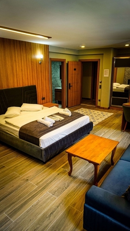 Imagen de la habitación del Ayder Kervansaray Deluxe Otel. Foto 11