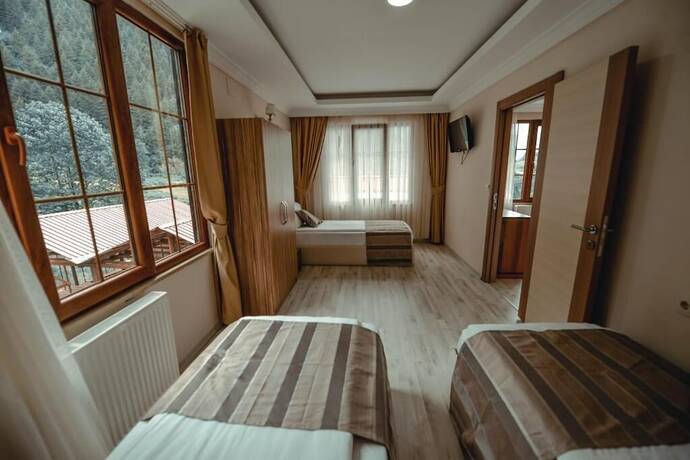Imagen de la habitación del Aygun Suites Hotel Bungalow. Foto 15