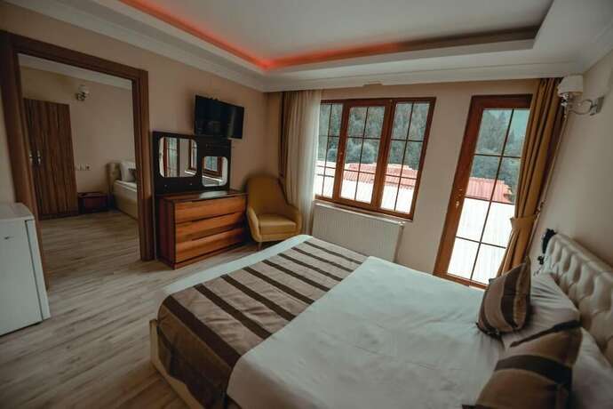 Imagen de la habitación del Aygun Suites Hotel Bungalow. Foto 17