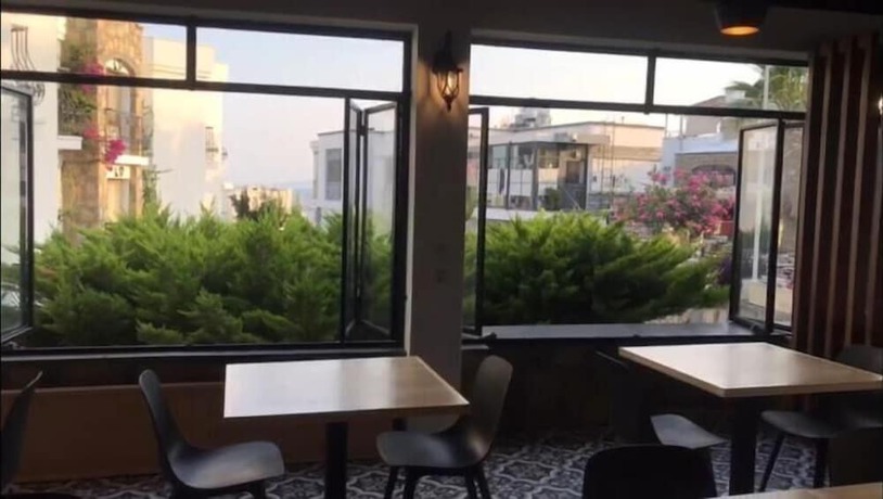 Imagen del bar/restaurante del Ayhan Suite Hotel. Foto 13