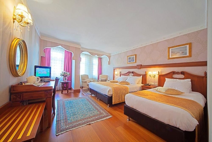 Imagen de la habitación del Azade Hotel. Foto 15