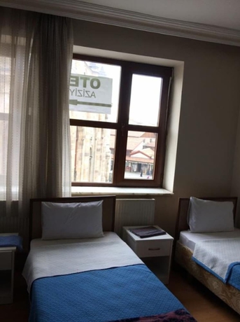 Imagen de la habitación del Aziziye Otel. Foto 4