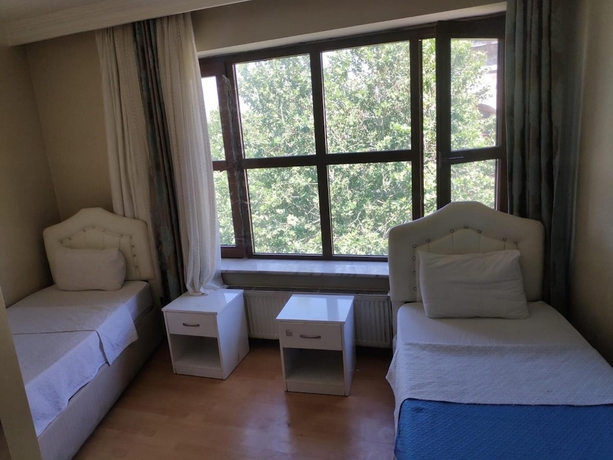 Imagen de la habitación del Aziziye Otel. Foto 8