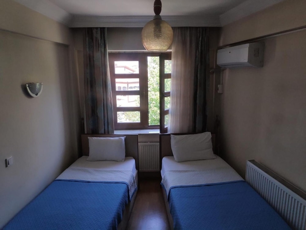 Imagen de la habitación del Aziziye Otel. Foto 13