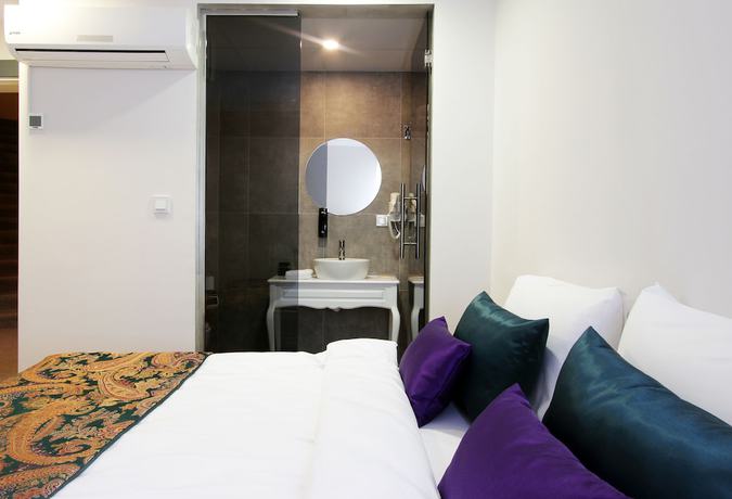 Imagen de la habitación del Azuu Hotel. Foto 17