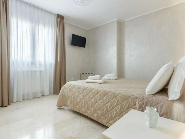 Imagen de la habitación del Azzurra Apartments. Foto 11