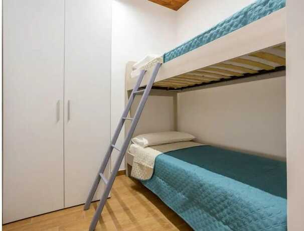 Imagen de la habitación del Azzurra Apartments. Foto 15