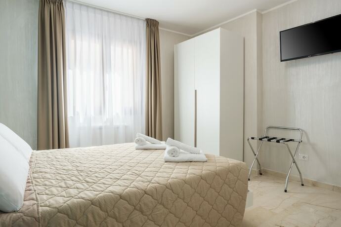 Imagen de la habitación del Azzurra Apartments. Foto 16