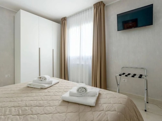 Imagen de la habitación del Azzurra Apartments. Foto 18