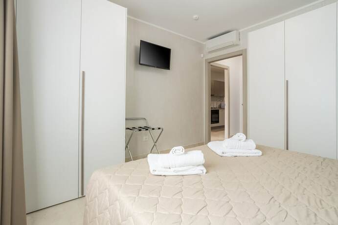 Imagen de la habitación del Azzurra Apartments. Foto 20