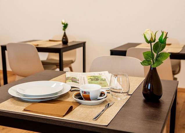 Imagen del bar/restaurante del B Home Apart Hotel by Alpha. Foto 3