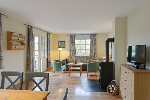 Imagen de la habitación del BEECH Resort Fleesensee. Foto 11