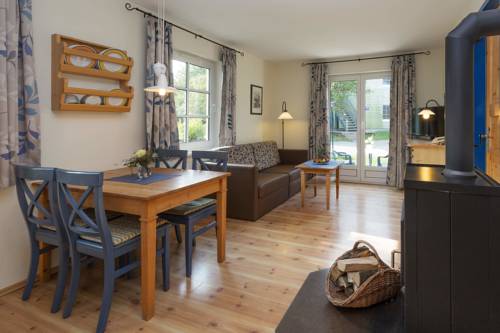 Imagen de la habitación del BEECH Resort Fleesensee. Foto 13