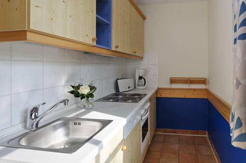 Imagen de la habitación del BEECH Resort Fleesensee. Foto 14